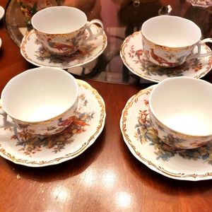 Set of 4 tea cups with souser..Exotic Birds